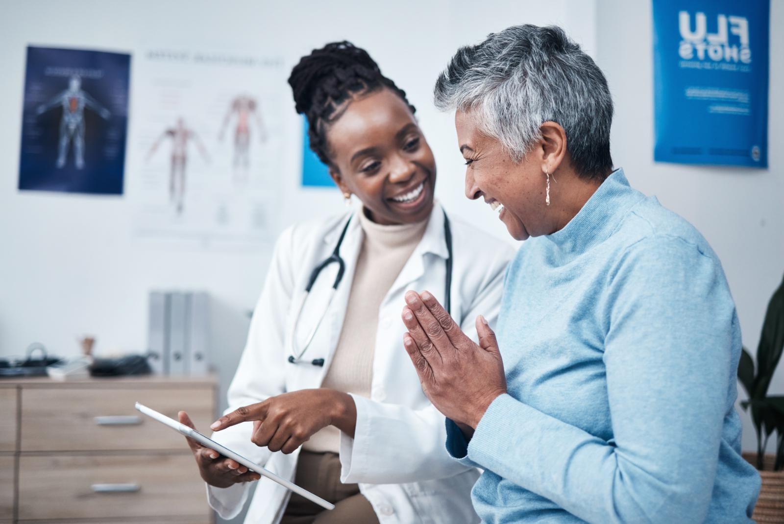 Healthcare professional guiding patients through health risk assessments