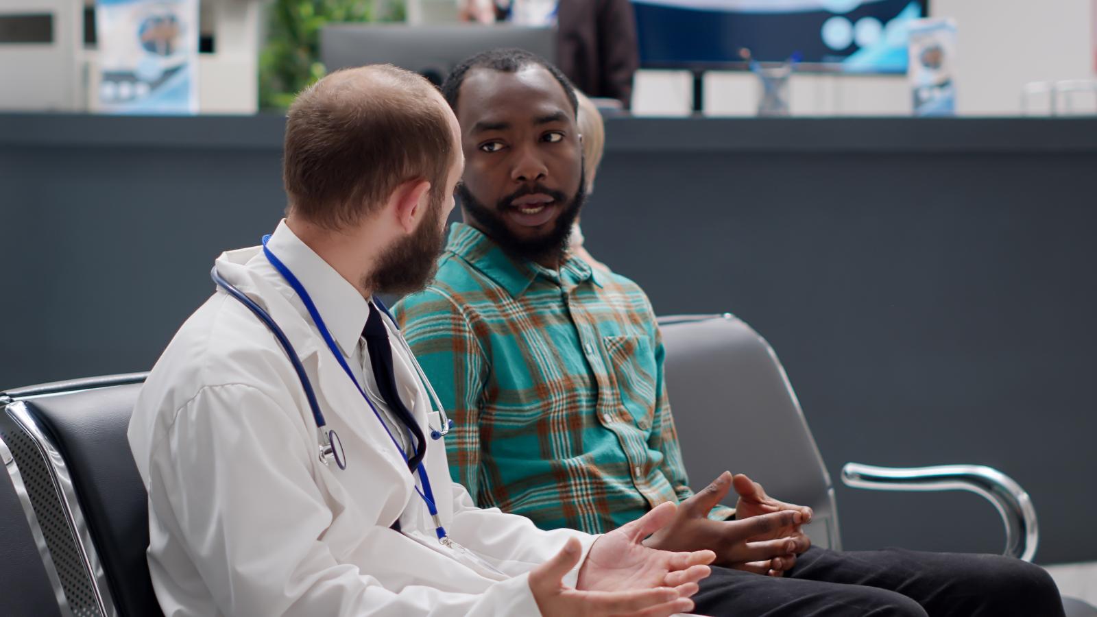 Healthcare professional guiding patients through health risk assessments